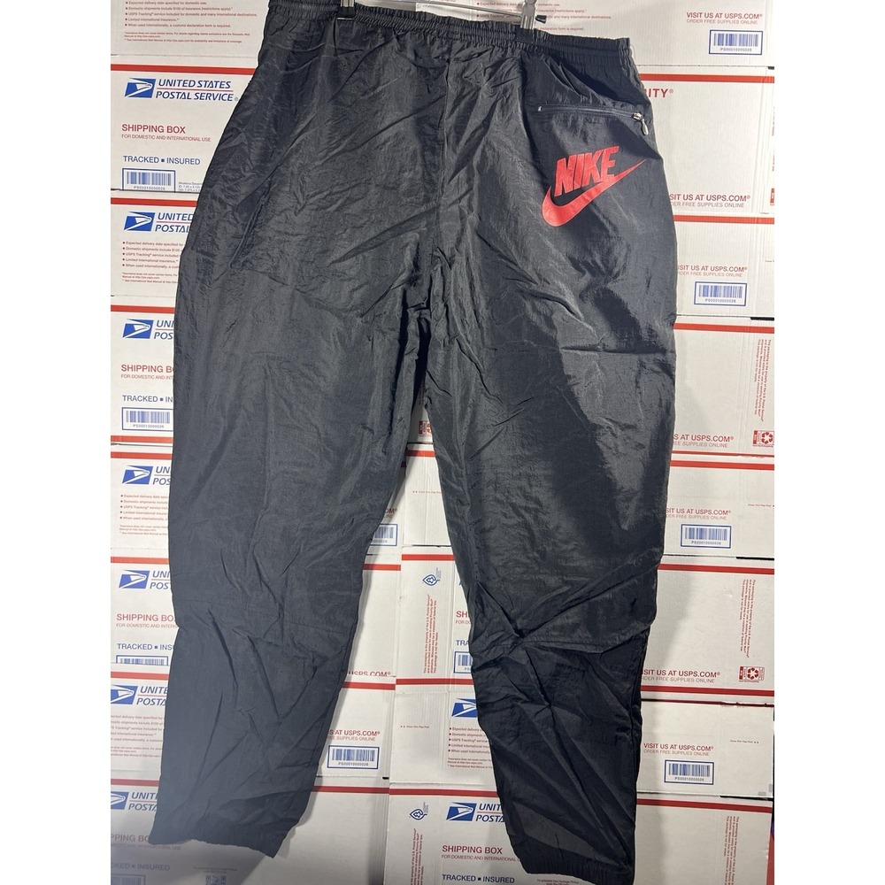 Vintage Nike Track Pants Black with Red Logo Nylon Zip Ankle Y2K L 90s 80s - Picture 1 of 5